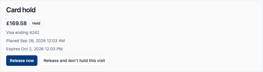 Card hold panel on an invoice with Release now and Release and don’t hold this visit buttons